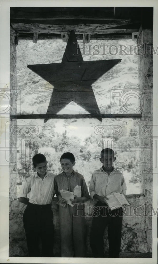 1962 Press Photo Huge wooden Red Star hangs over tower in Tirana, Albania