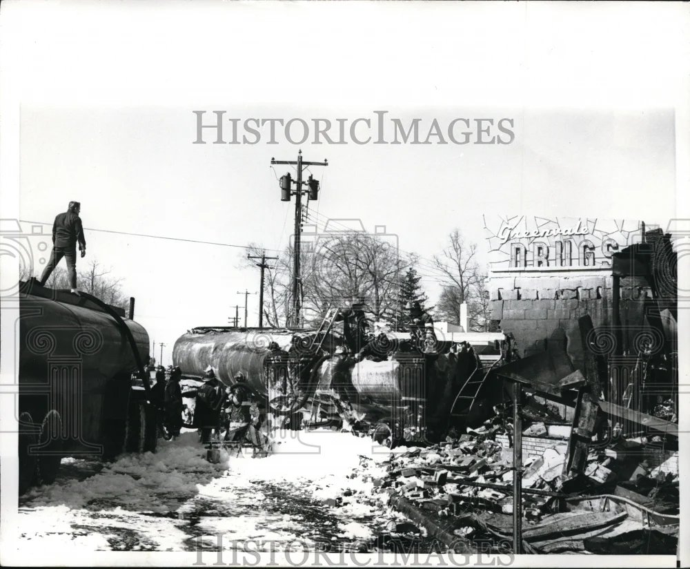 1970 Press Photo The aftermath of a train wreck with fire removed by fire men.