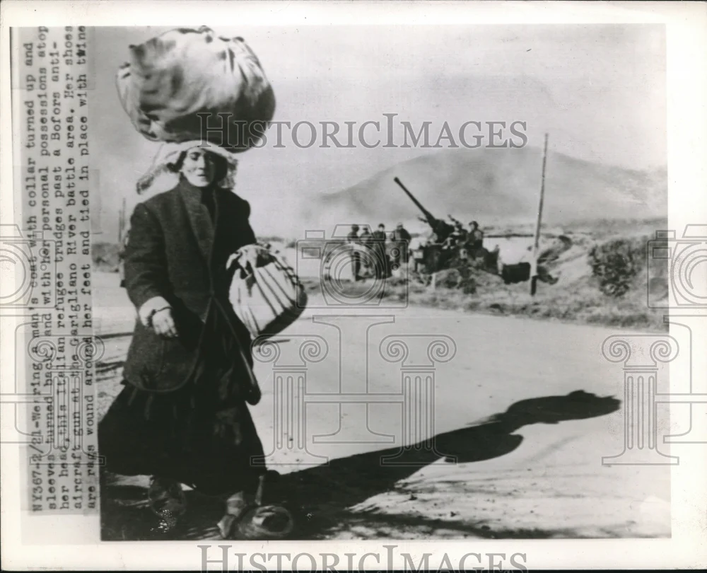 Press Photo Wearing A Man's Coat With Collar Turned Up & Sleeves Turned Back