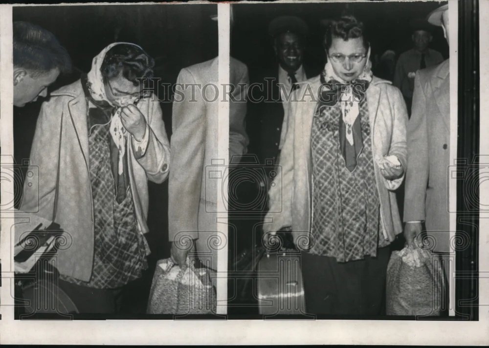 1957 Press Photo Nabejda Kozmin weeps as a newsman asks her about her sons she