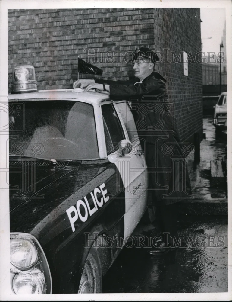 1967 Press Photo Policeman Jack Cornachio & his cruiser