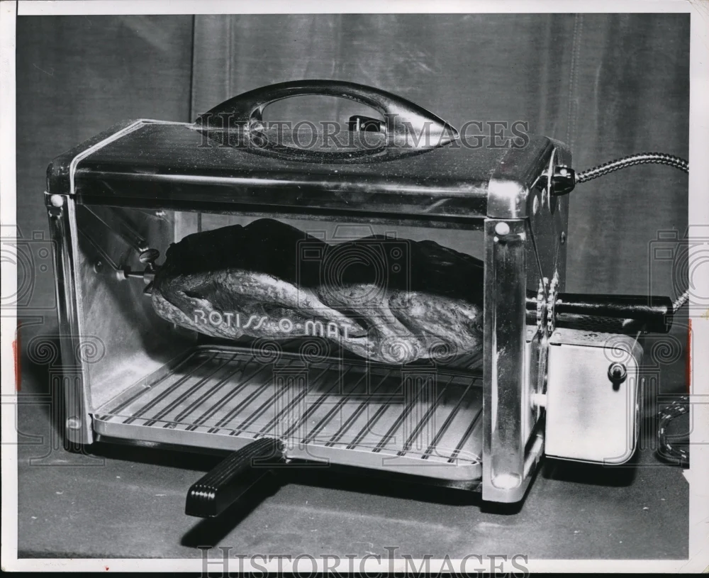 1953 Press Photo A Rotiss o mat oven demoed in a kitchen