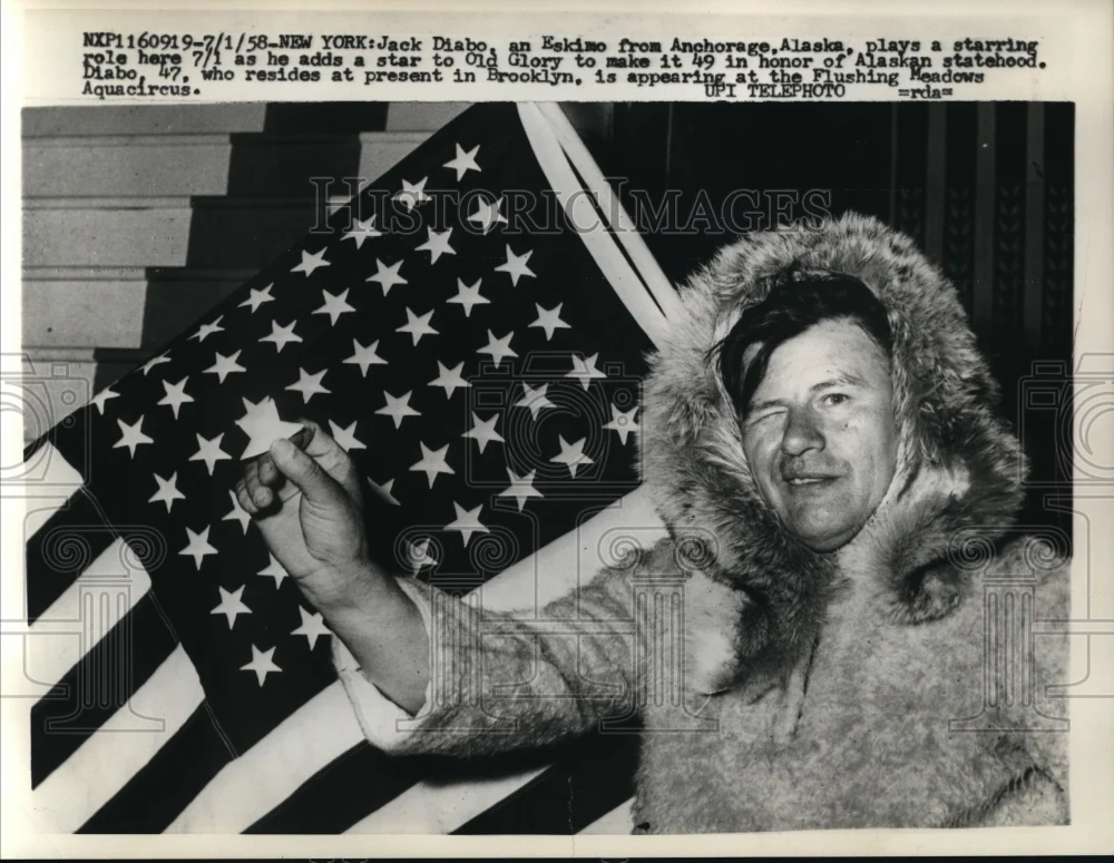 1958 Press Photo Eskimo Jack Diabo adding 49th star to Old Glory in New York