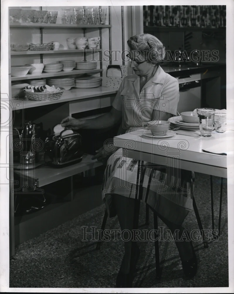 1956 Press Photo Dish cabinet is conveniently located for setting table and