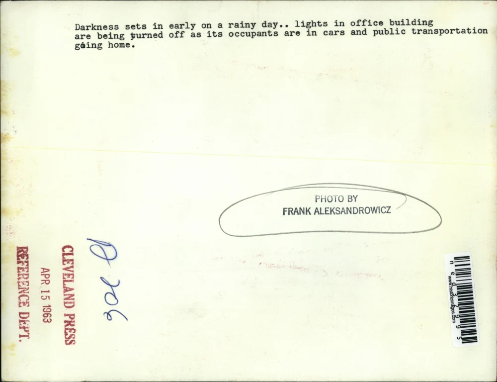 1963 Press Photo Darkness sets in on a rainy day lights in office building are - Image 2