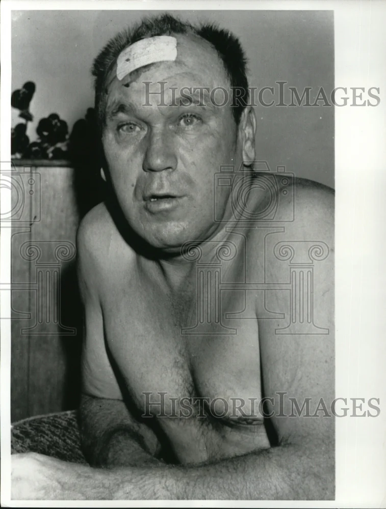 1963 Press Photo Matt Rauhala Appears Dazed After Going Thru Plywood