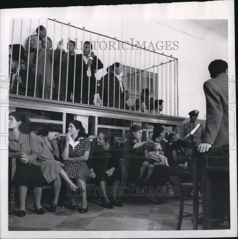 1954 Press Photo Sicily Men in cage were arrested when a crowd rioted to protest