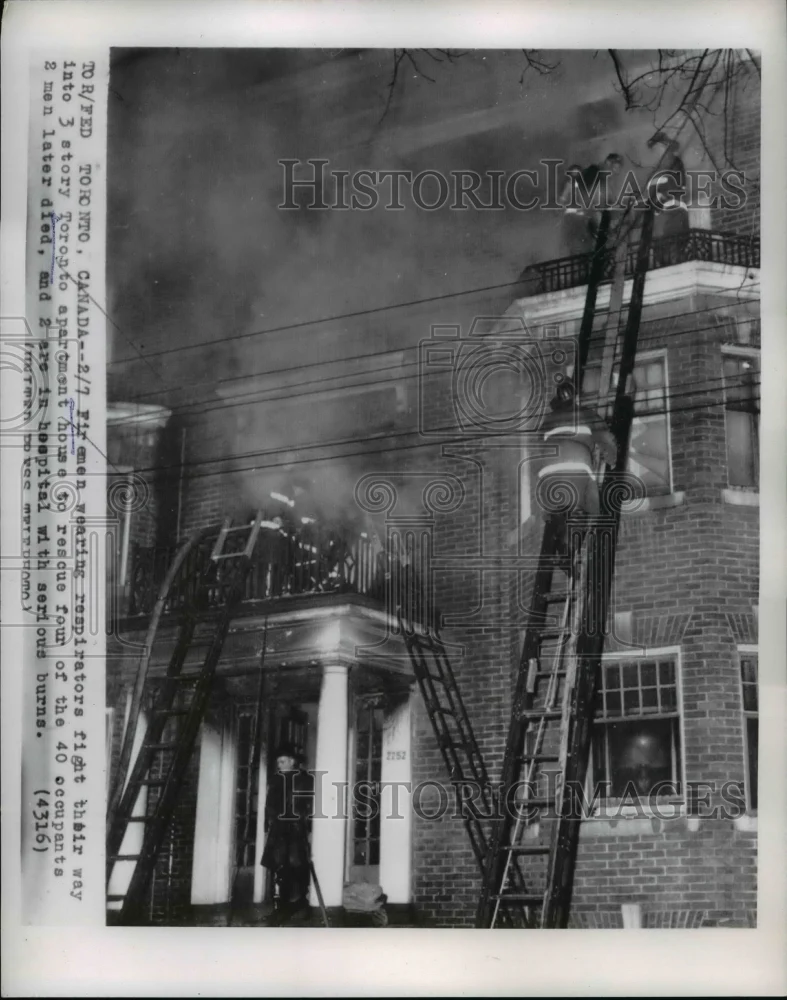 1956 Press Photo Toronto Canada firemen battle apartment house fire - ned81131