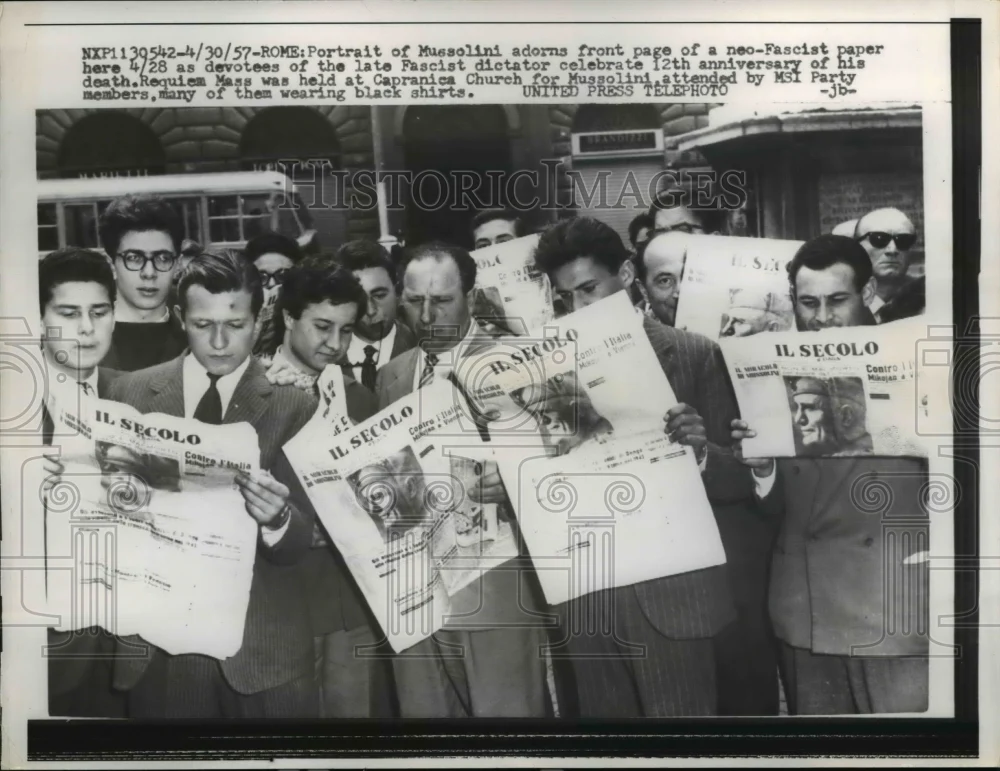 1957 Press Photo Portrait of Mussolini adorns front page of paper - nee26551