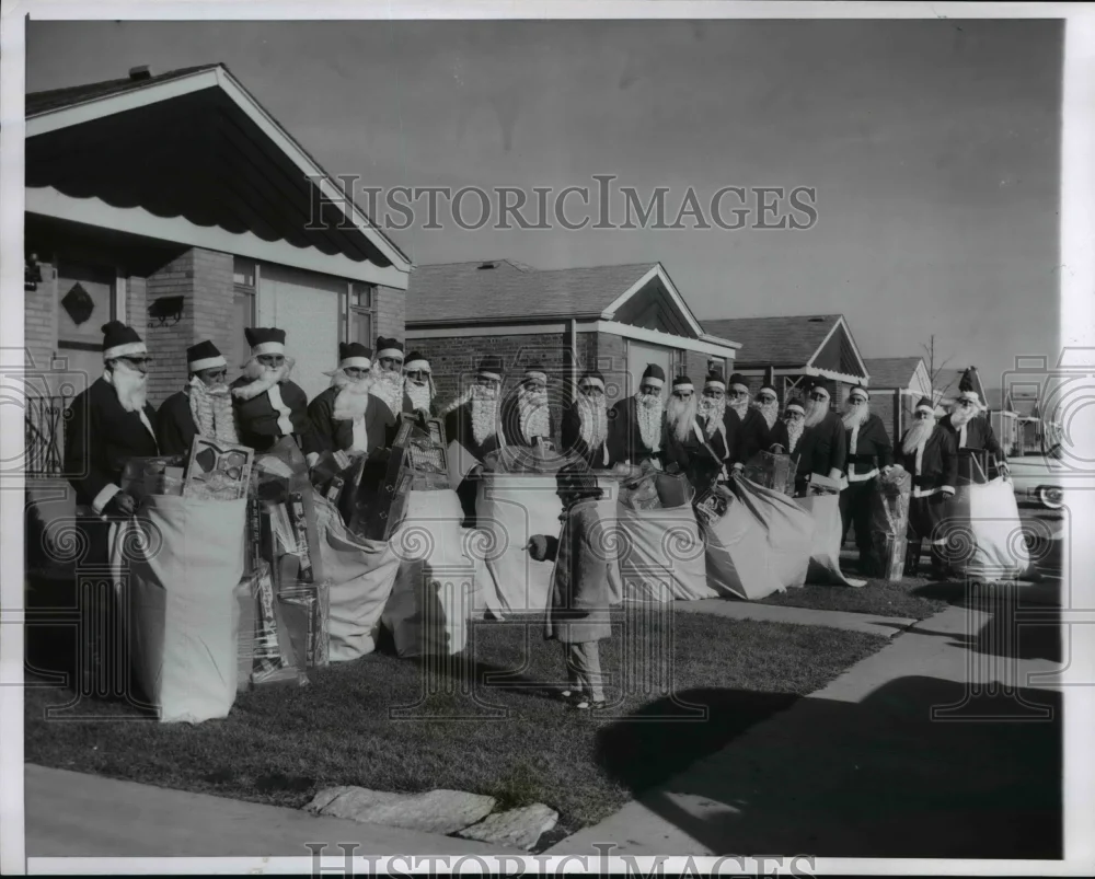 1957 Press Photo if Roseann Kuchar in front 19 Santa's