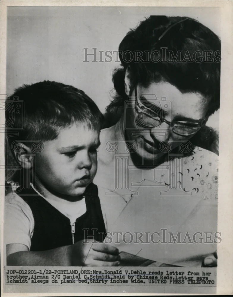 1955 Press Photo Mrs. Donald V. Dehle, Boy Read Letter from POW Brother