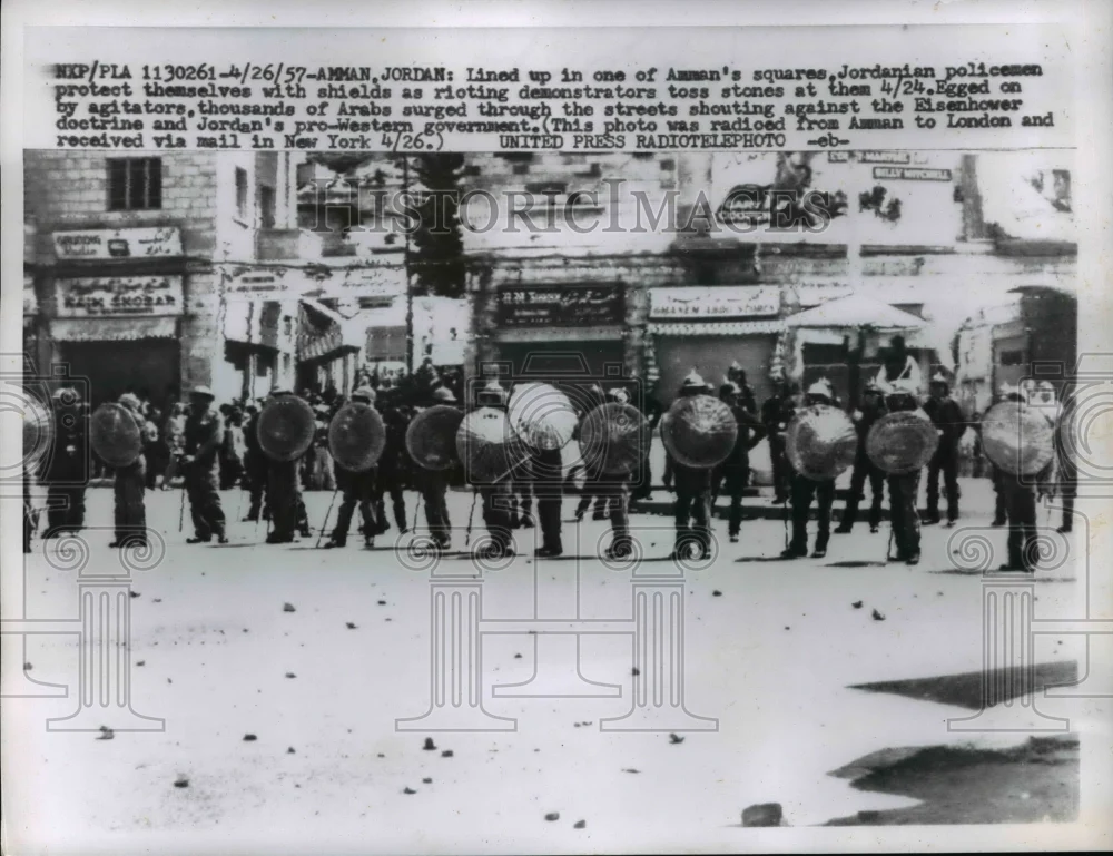 1957 Press Photo Jordanian Policemen lined up with shields for Rioters