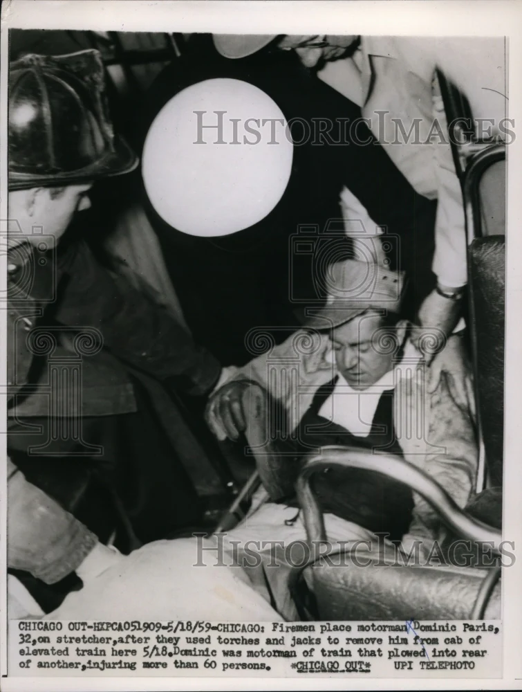 1959 Press Photo Firemen Put Dominic Paris on Stretcher After Remove From Cab