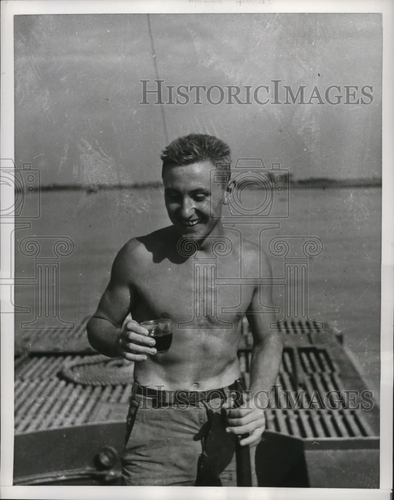 1953 Press Photo Red River Sailor Drinking Red Wine on French Navy Ship