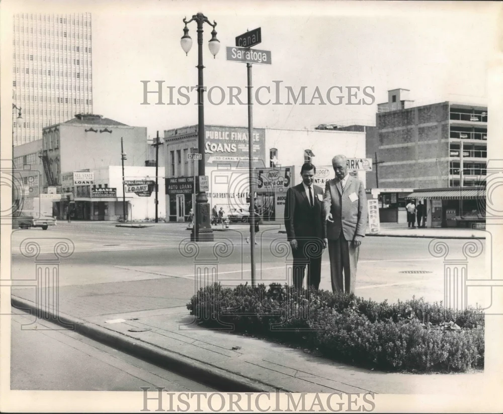 1966 Press Photo Business men standing on median of Canal Street, New Orleans