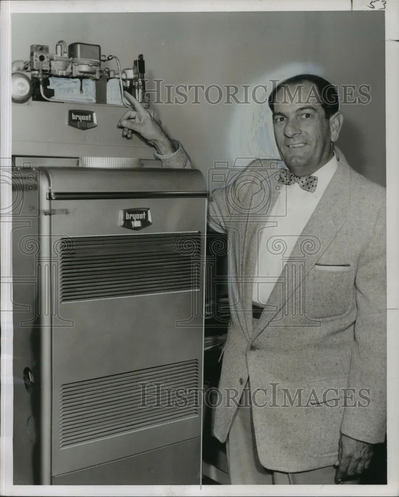 1957 Press Photo L. Charles Cressy, Bryant, Leaumont Company, shows new furnace