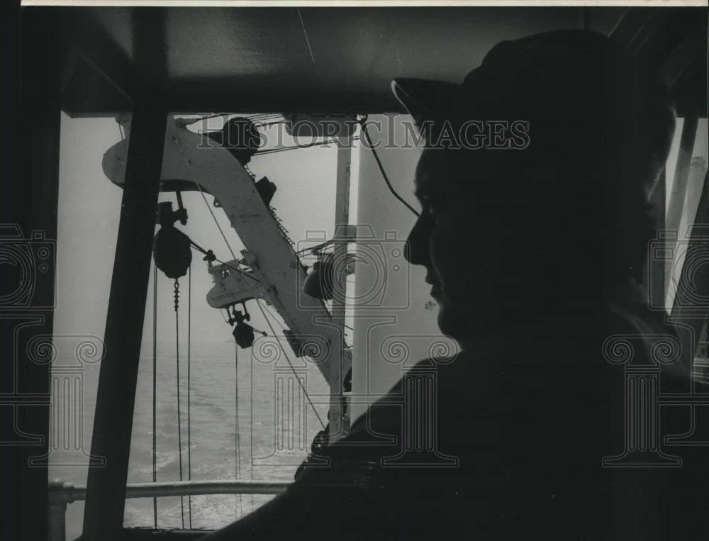 1974 Press Photo Man Looks Out Window of Ship - nob02461