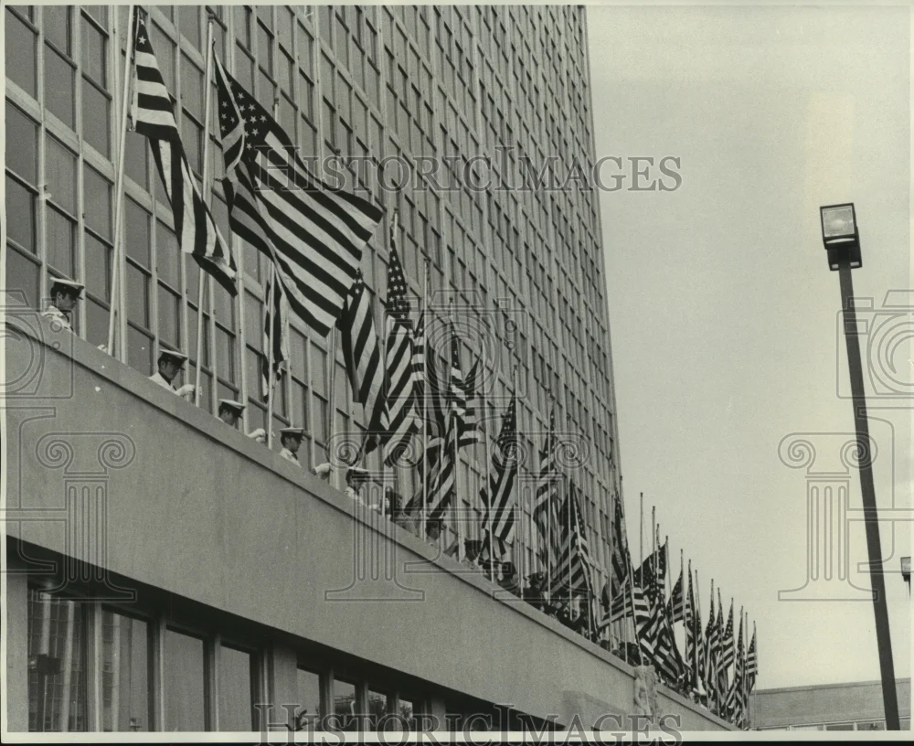 1975 Press Photo Hundreds of American Flag raised during Flag Day - nob06960