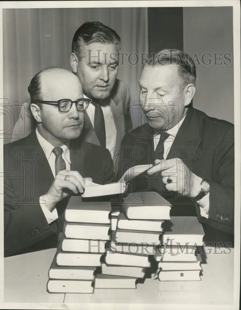 1964 Press Photo German consulate Hans Marmann presents books to Jerome Cushman