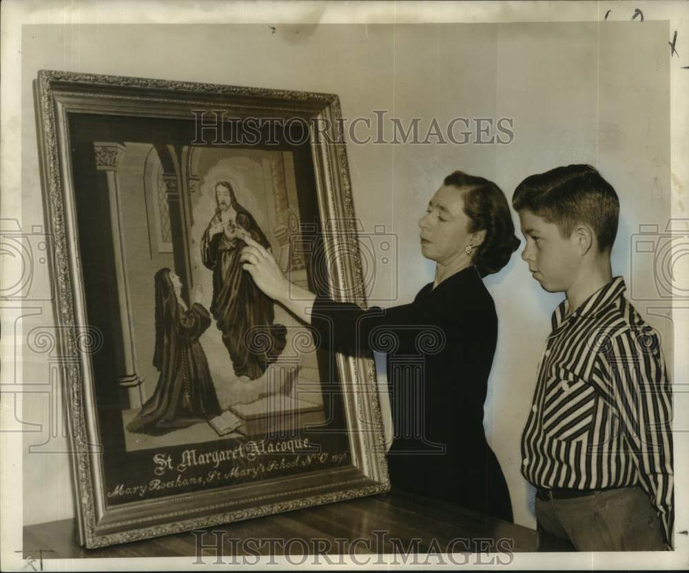 1958 Press Photo Irma Messmer, Son Lloyd Inspect Religious Needlepoint Artwork