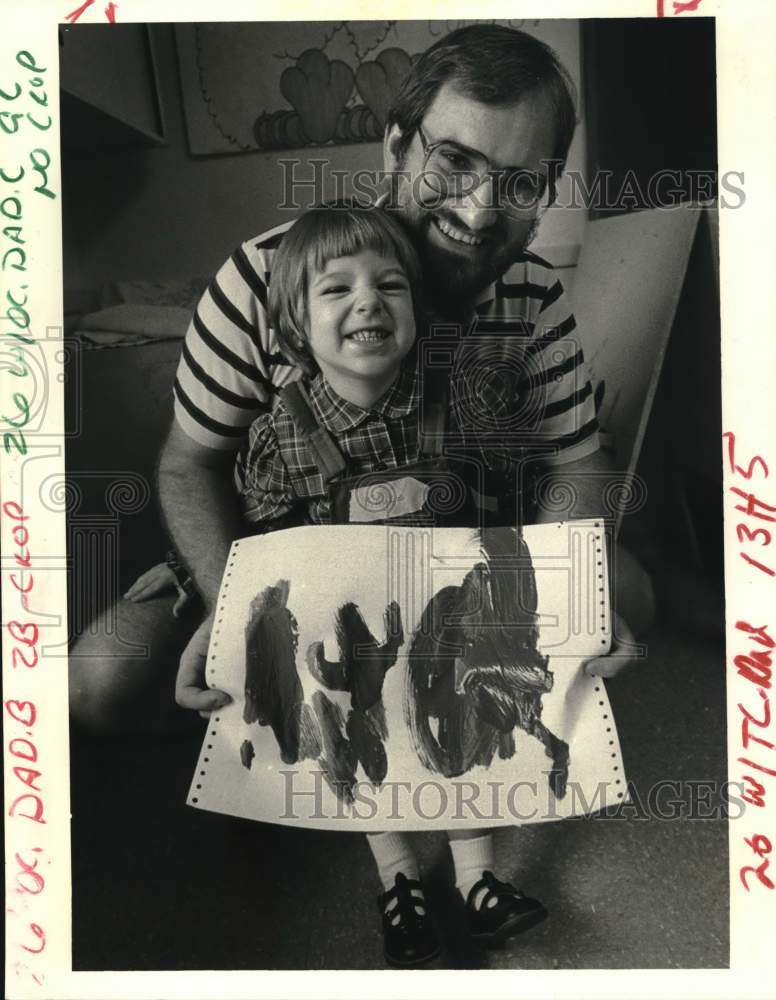 1987 Press Photo Gordon Stackel shows of his daughter Kayce's watercolor