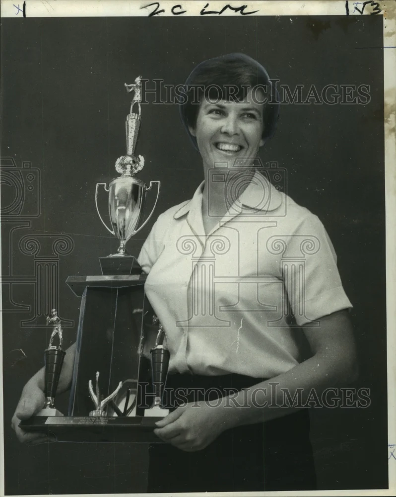 1969 Press Photo Miss Judy Dufrene, Spark softball team, holds team's trophy