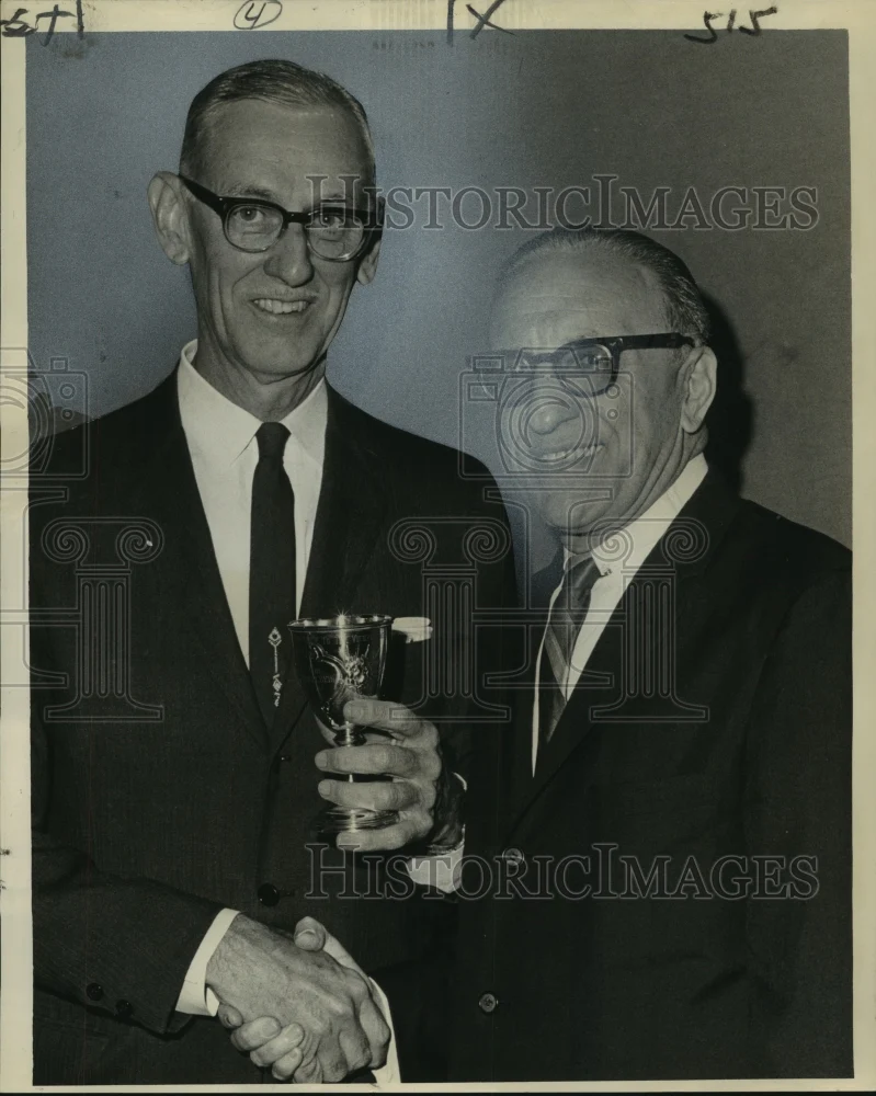 1963 Press Photo Lawrence J. Dumestre shows trophy - improvement historic area