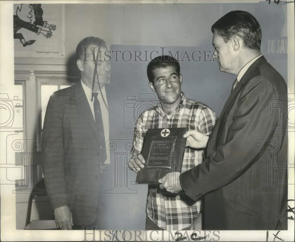 1968 Press Photo Gerald A. Hanzo receives plaque in saving a man from drowning