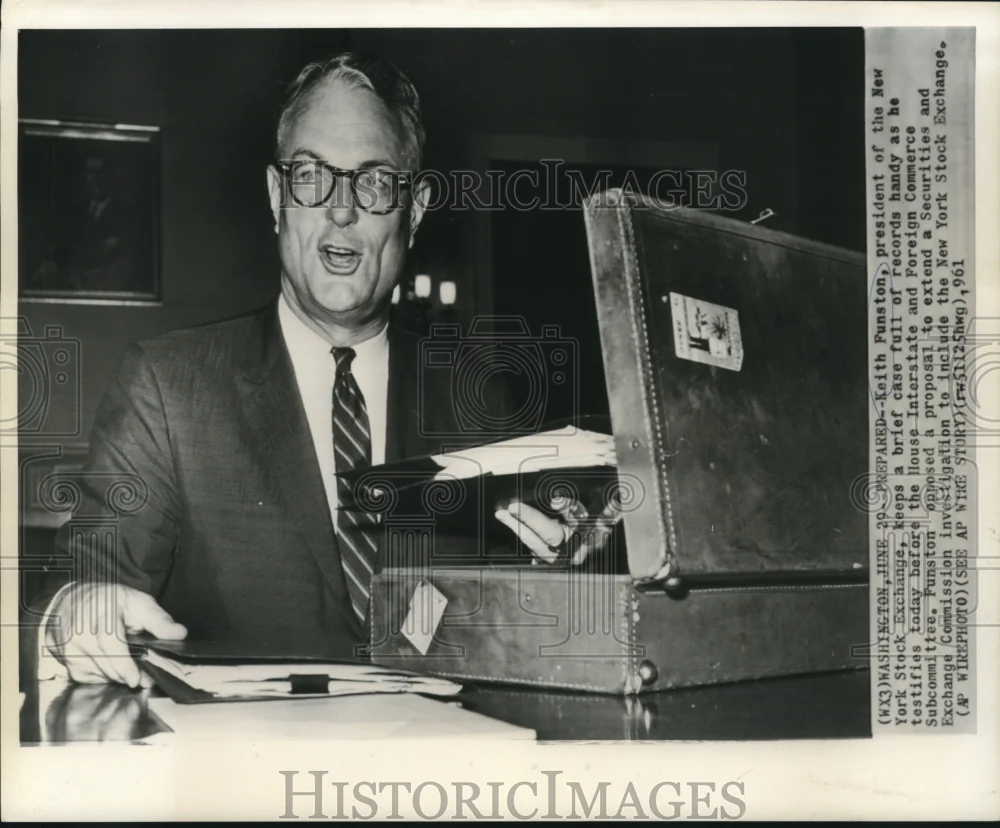 1961 Press Photo Keith Funston, Stock Exchange President, prepared with records