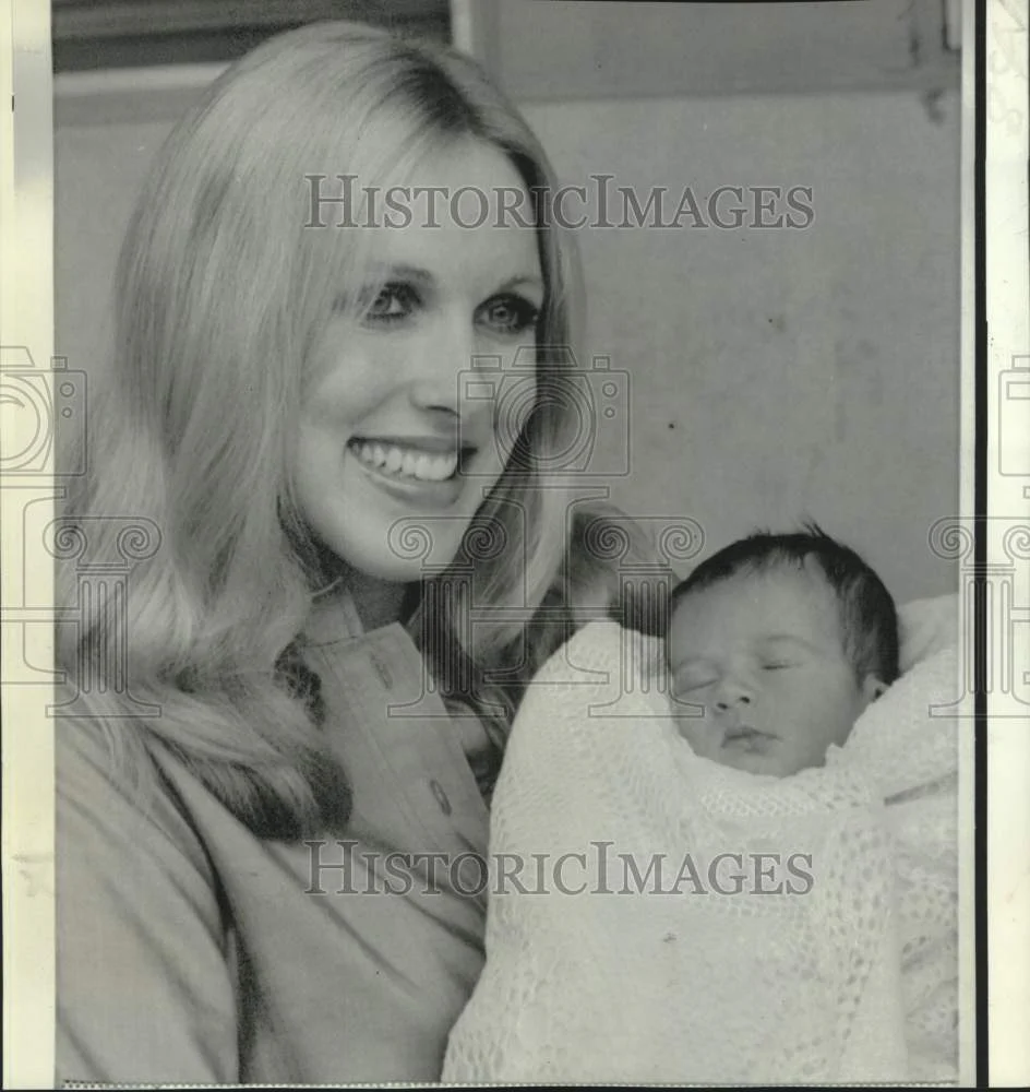 1974 Press Photo George Hamilton's wife and new son George Ashley Hamilton.