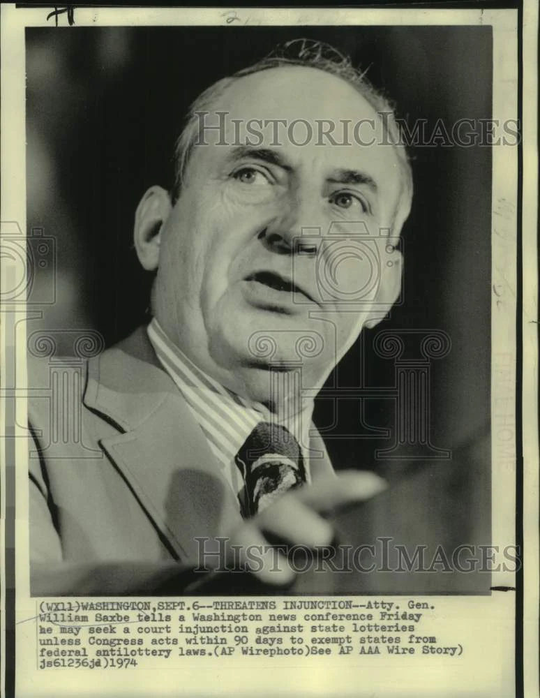 1974 Press Photo Attorney General William Saxbe Talks State Lottery Injunction