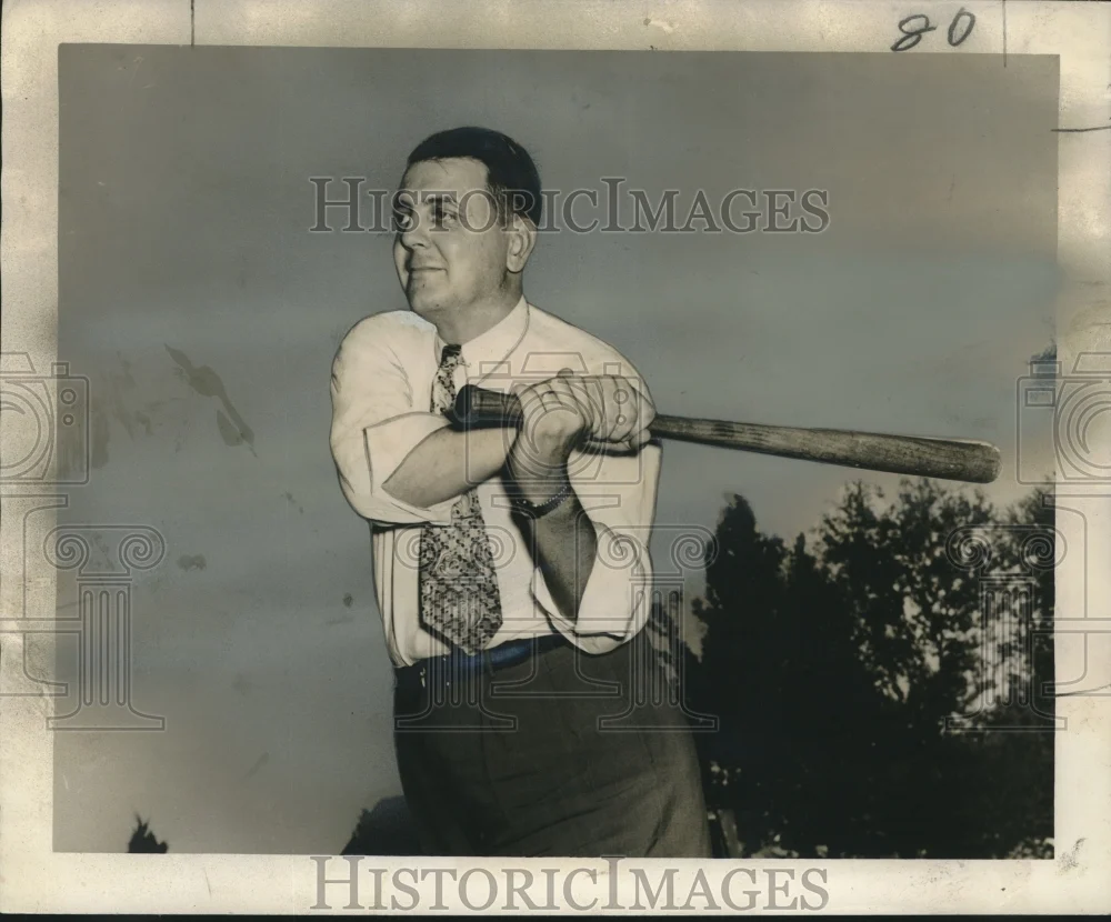 1950 Press Photo Reverend William G. Foster, Jr. swings a baseball bat