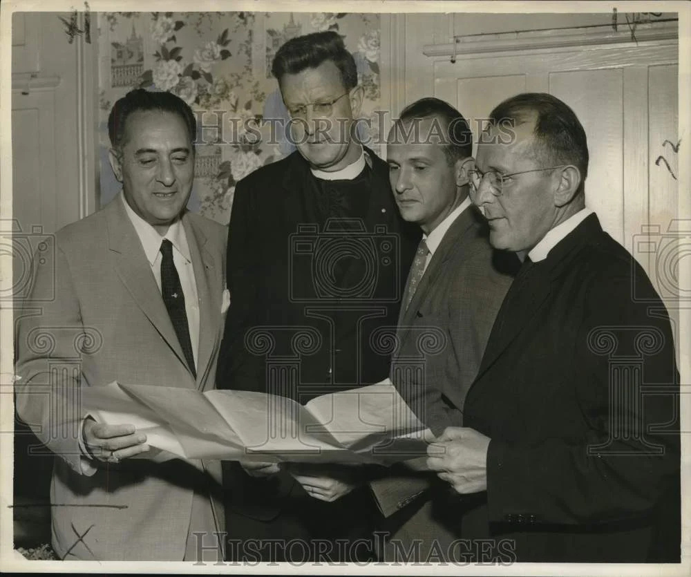 1957 Press Photo Holy Name Society members study plans for an upcoming rally
