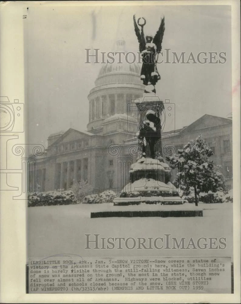 1959 Press Photo A statue at the Arkansas State Capitol covered in snow